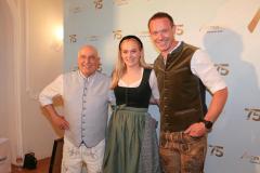 Dr. Axel Munz, Anna Bereiter, Johannes Lochner (von li. nach re.), 75 Jahre Trachten Angermaier im Silbersaal im Deutschen Theater in München 2023